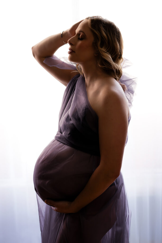 Maternity boudoir session in Oshkosh photography studio